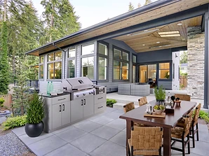 American Outdoor Grill stainless steel grill built into an outdoor kitchen island